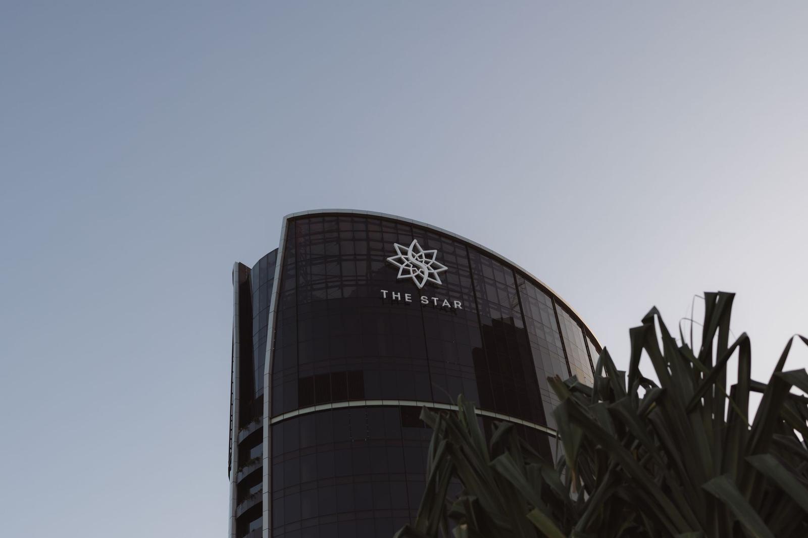 A Tall Building with a Large Sign on It